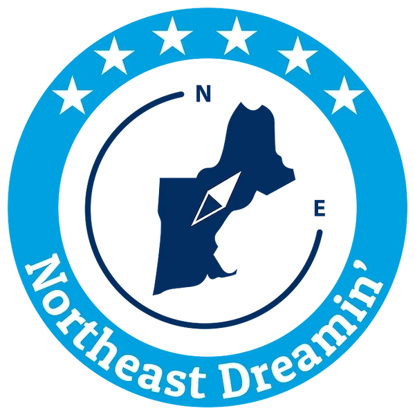 Blue circle with the northeast region of the US in side it, the logo of the Northeast Dreamin event